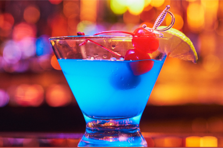 Blue tinted cocktail with garnish